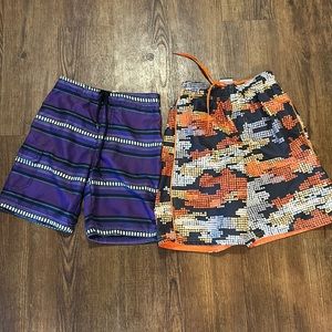 2 pairs Nike swim trunks size boys small- 7/8